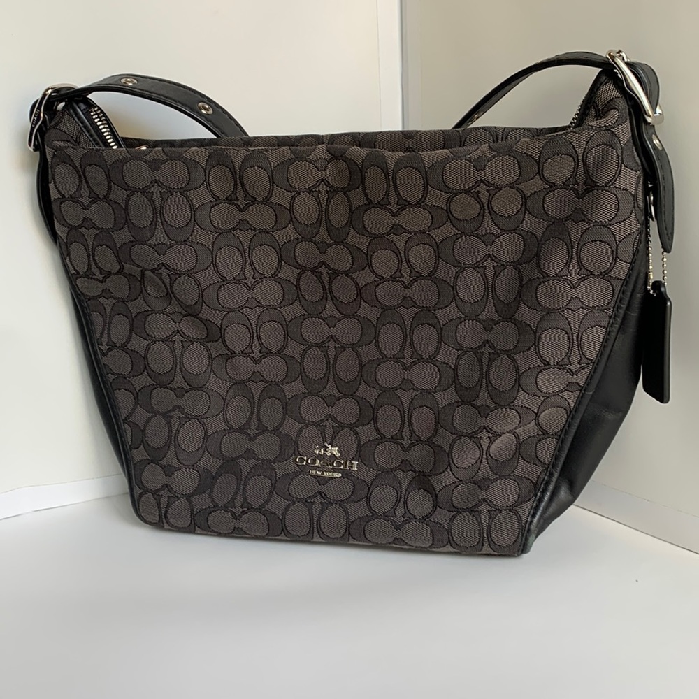 Black and gray Coach purse